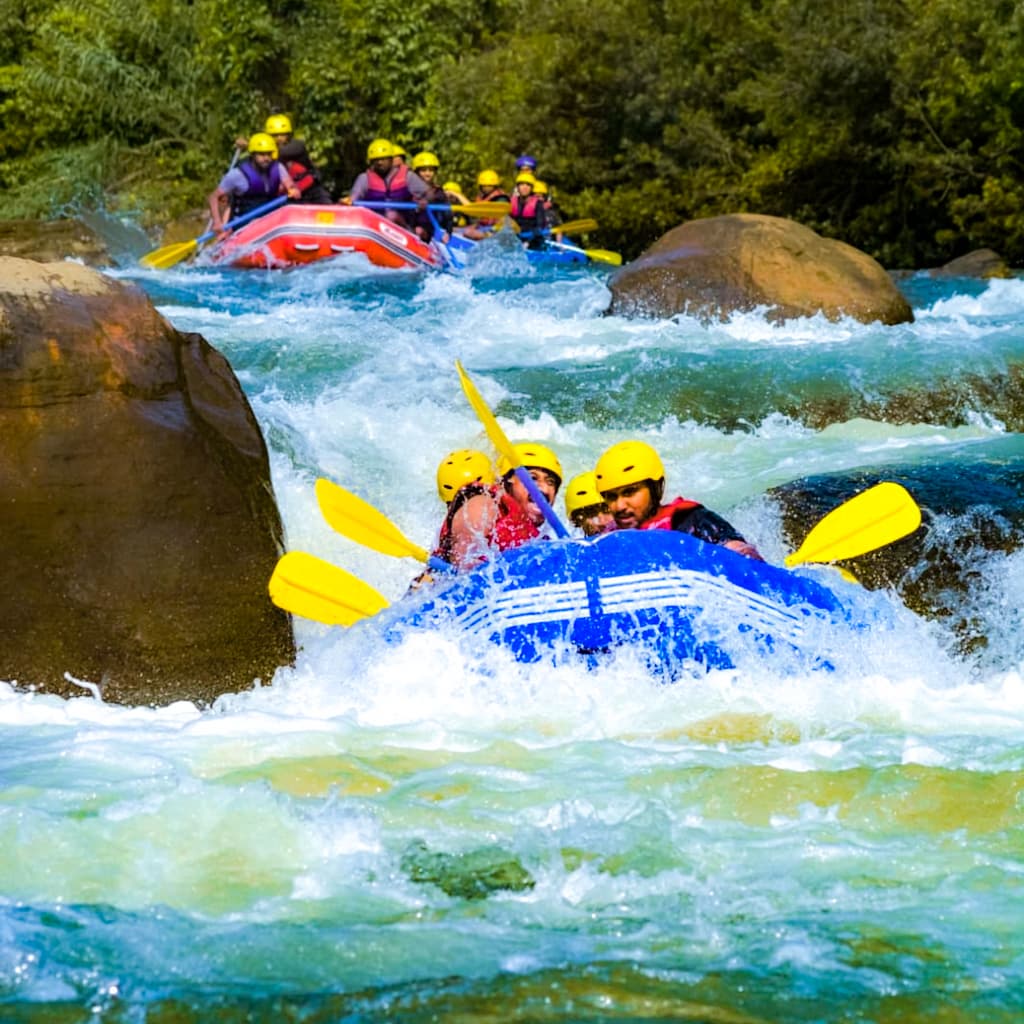 Raft crew running Kelani River rapids in Kithulgala
